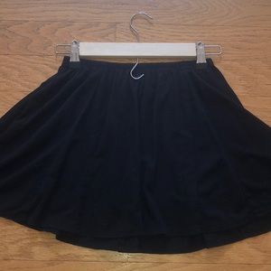 Brandy Melville mini skirt.